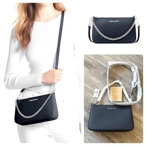 Bnwt MICHAEL KORS designer Jet Set travel navy genuine saffiano leather handbag.